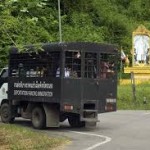 Refugees on the way to a Thai detention center, March 18, 2014. Image used courtesy of VOA News.