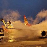 File photo of de-icing at the Kunming airport.